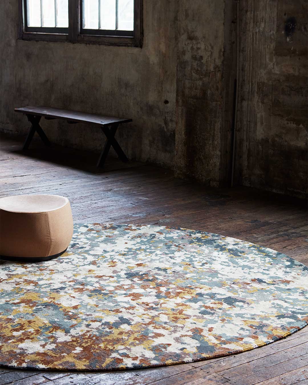 Styled image of painterly Moss rug by Hare + Klein