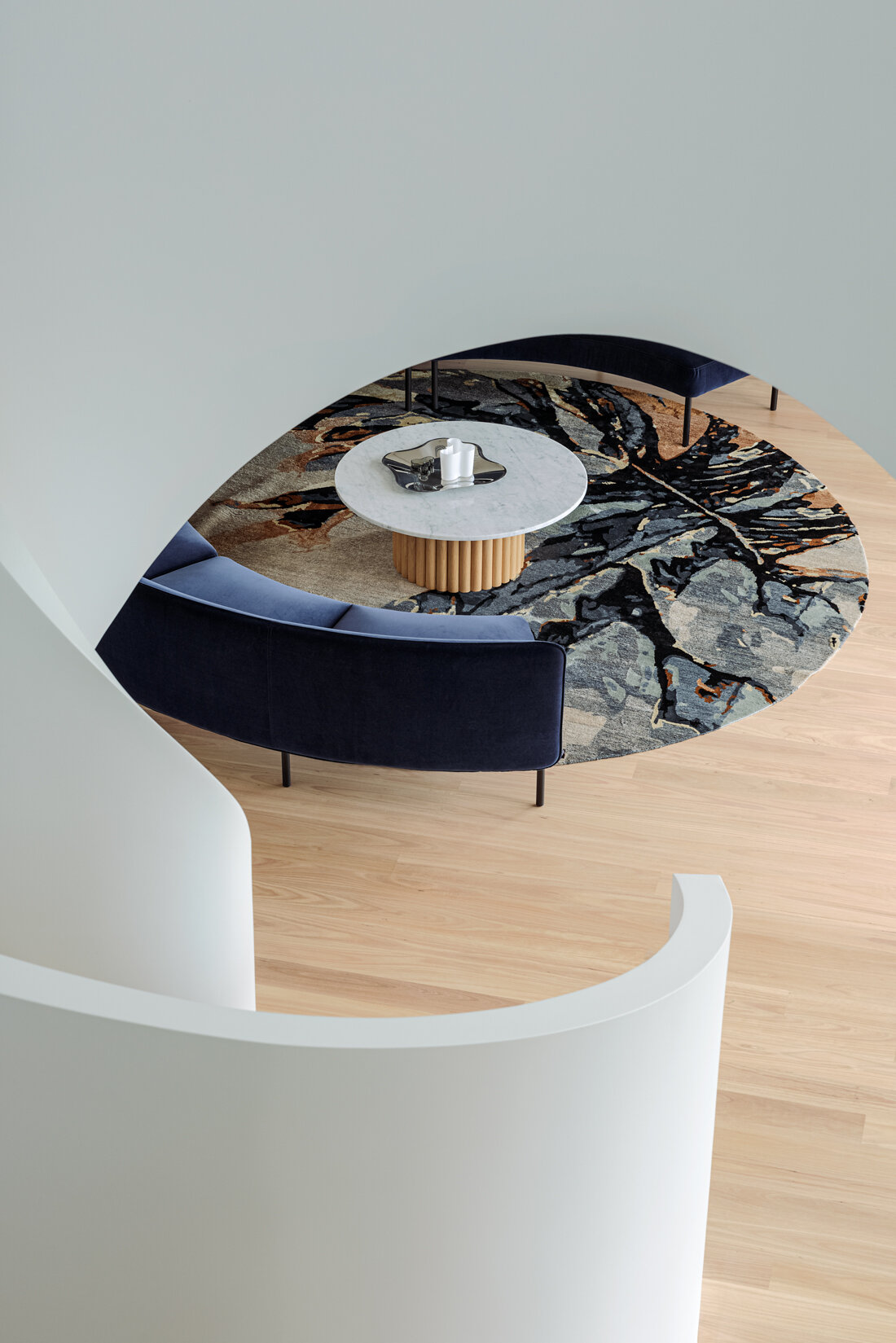 location shot of wings round rug by hare + klein