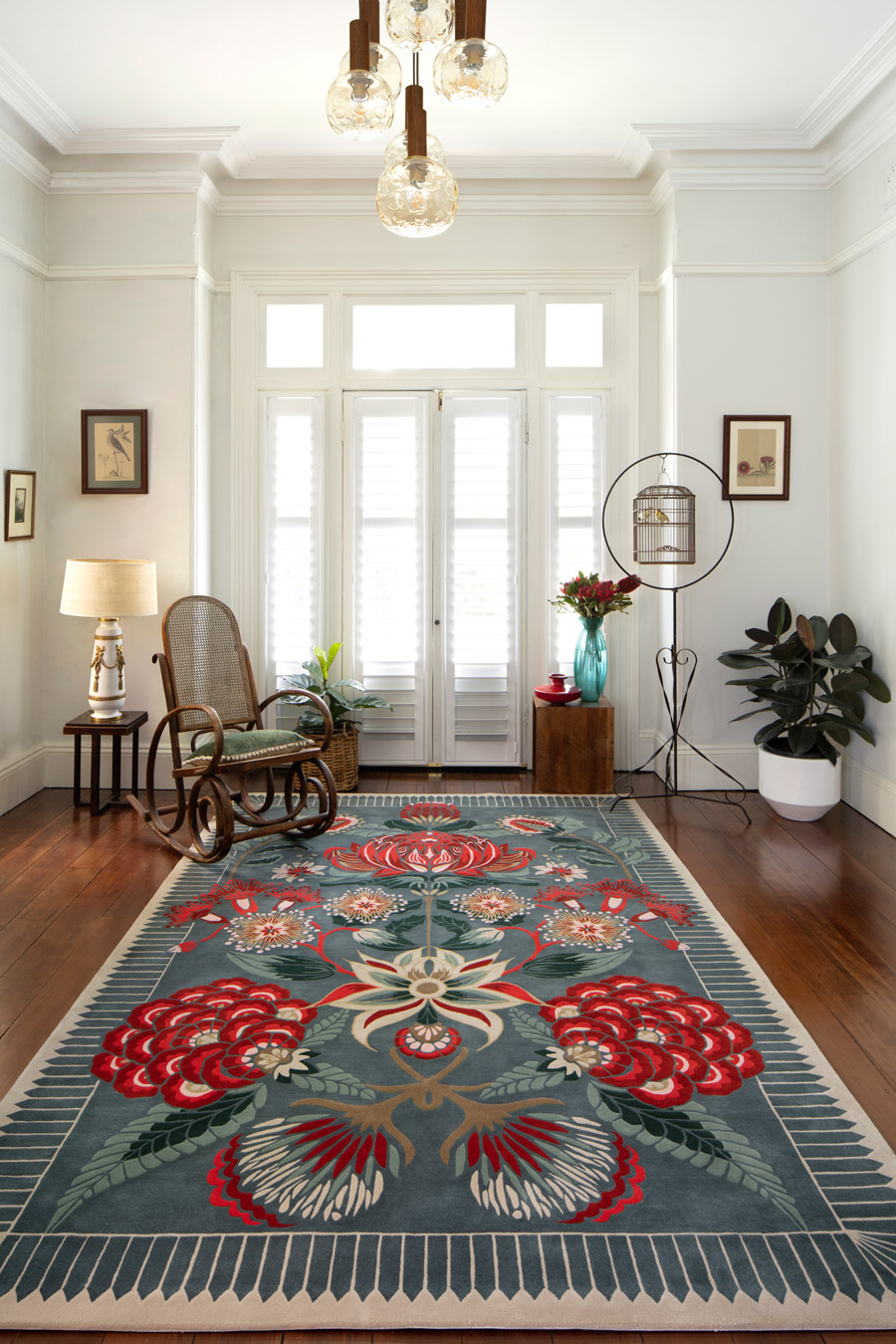 Living room image of floral Waratah Wonderland rug by House Of Heras in green colour
