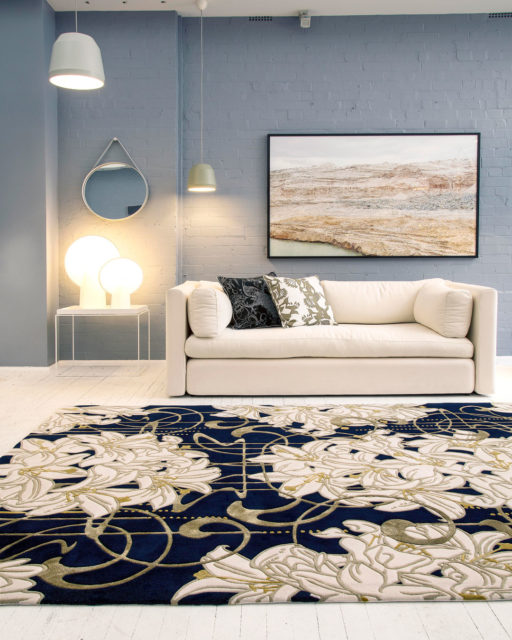 Living room image of art nouveau Lily Nouveau rug by Kingdom Home in gold colour