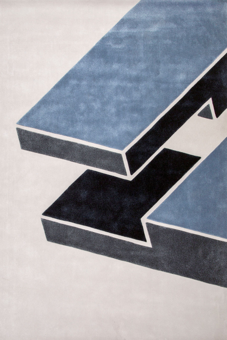 Overhead image of geometric Corner Halving rug by Mr Frag in blue colour