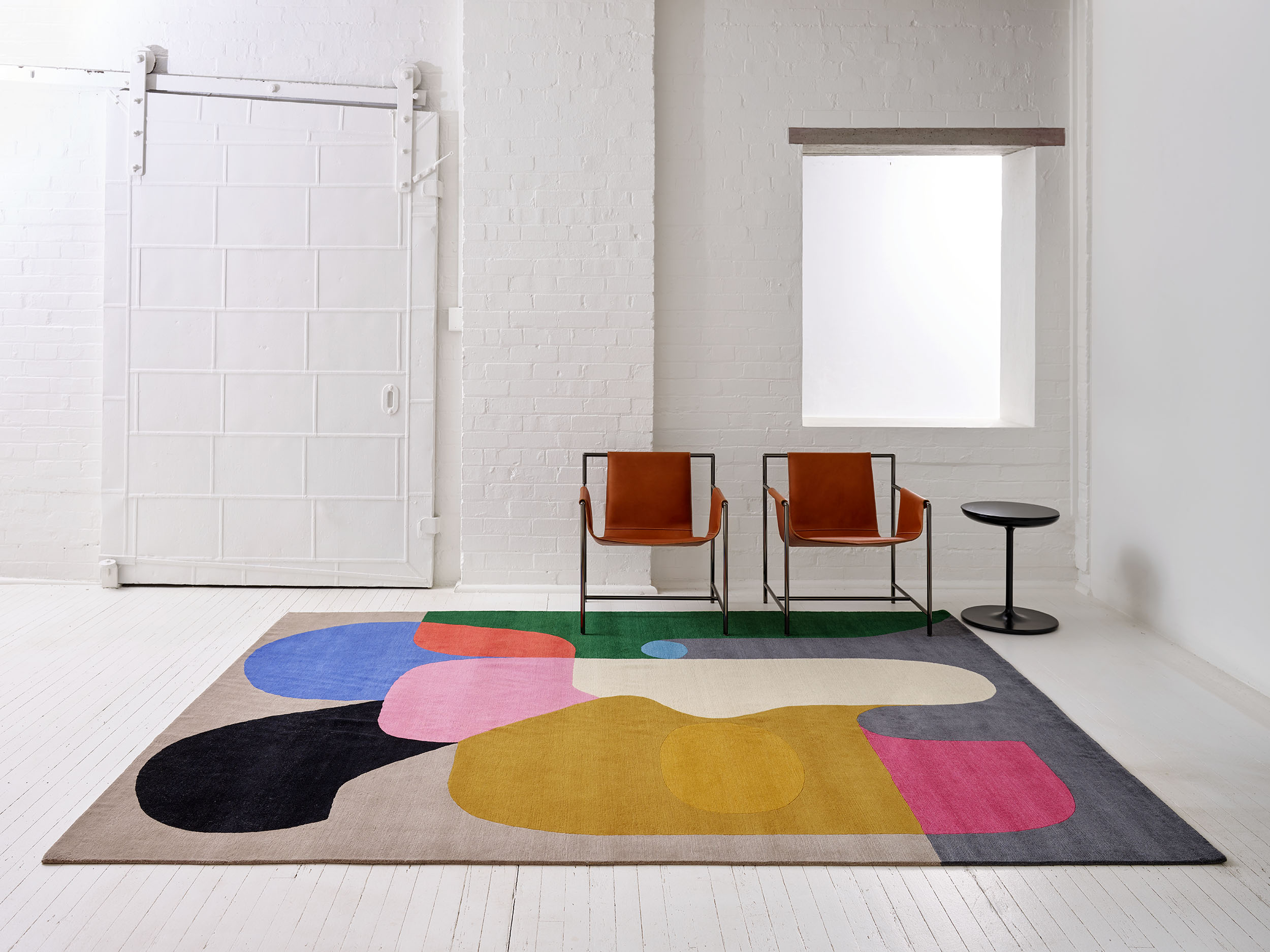 Entrance view of modern Crowded Room rug by Stephen Ormandy