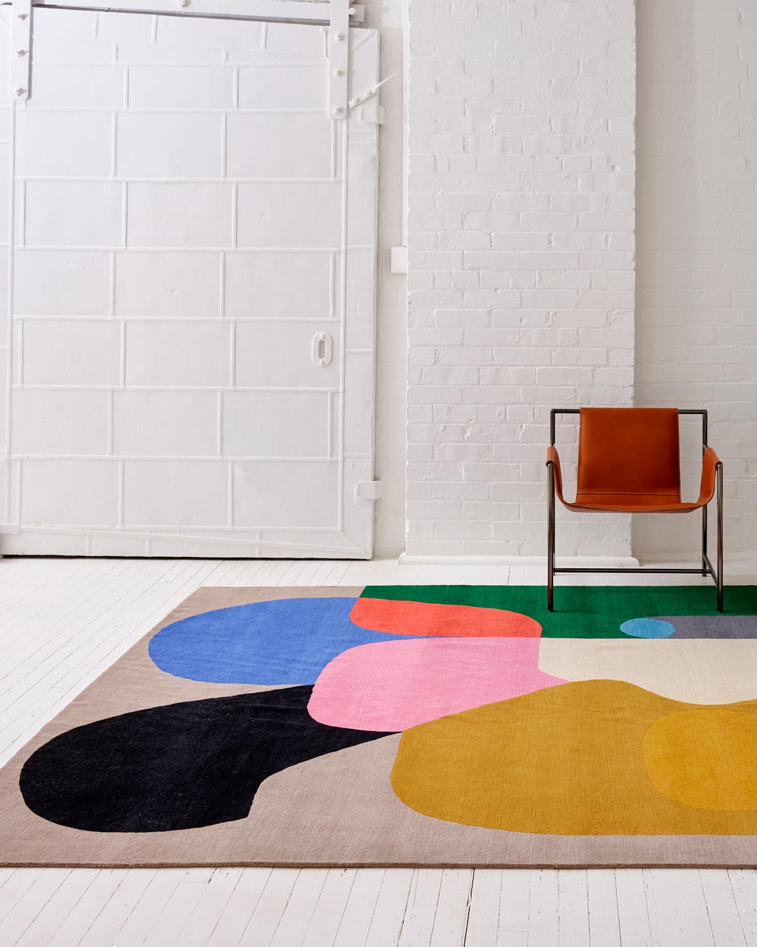 Entrance view of modern Crowded Room rug by Stephen Ormandy