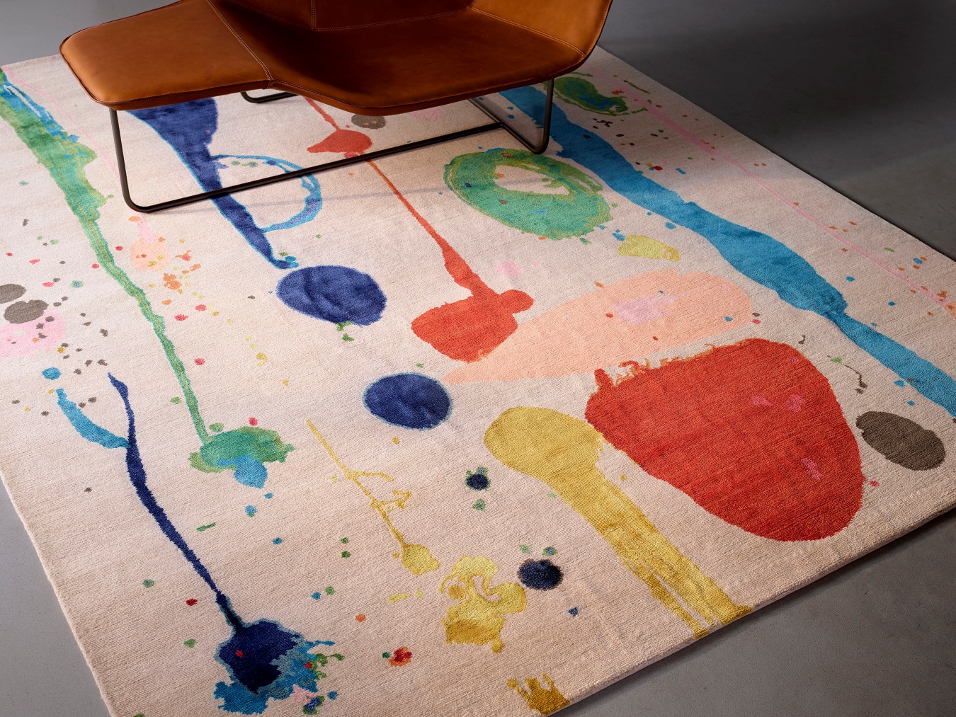 Close up image of painterly Dream Garden rug by Louise Olsen