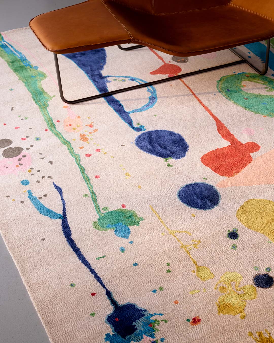 Close up image of painterly Dream Garden rug by Louise Olsen