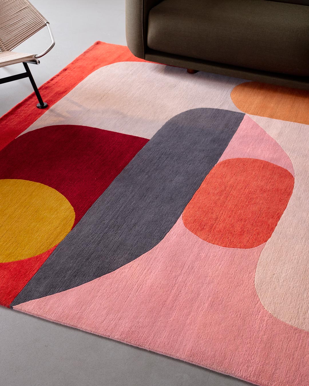 Close up image of modern Flamingo rug by Stephen Ormandy