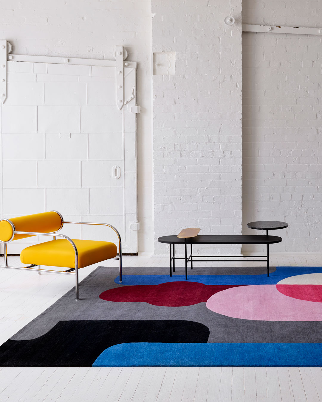 Styled image of geometric Twilight rug by Stephen Ormandy