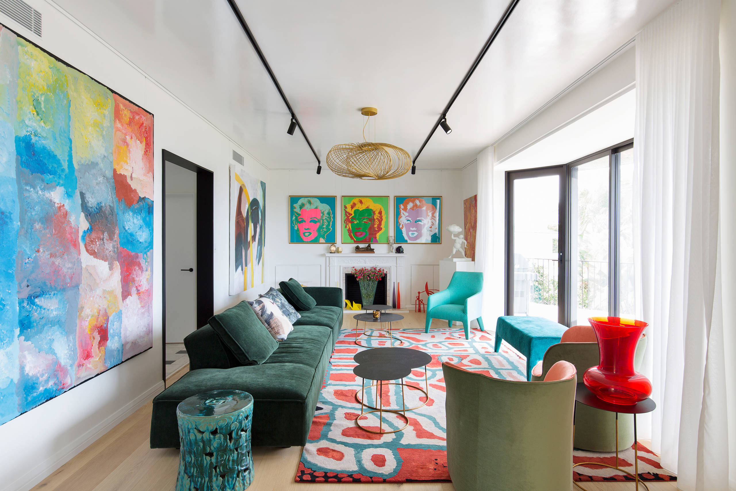 Indigenous Lungarung rug in red and green colour in a living room setting