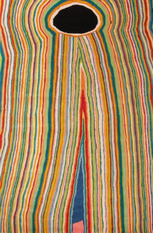 Overhead view of indigenous Untitled 2006 rug in rainbow colours