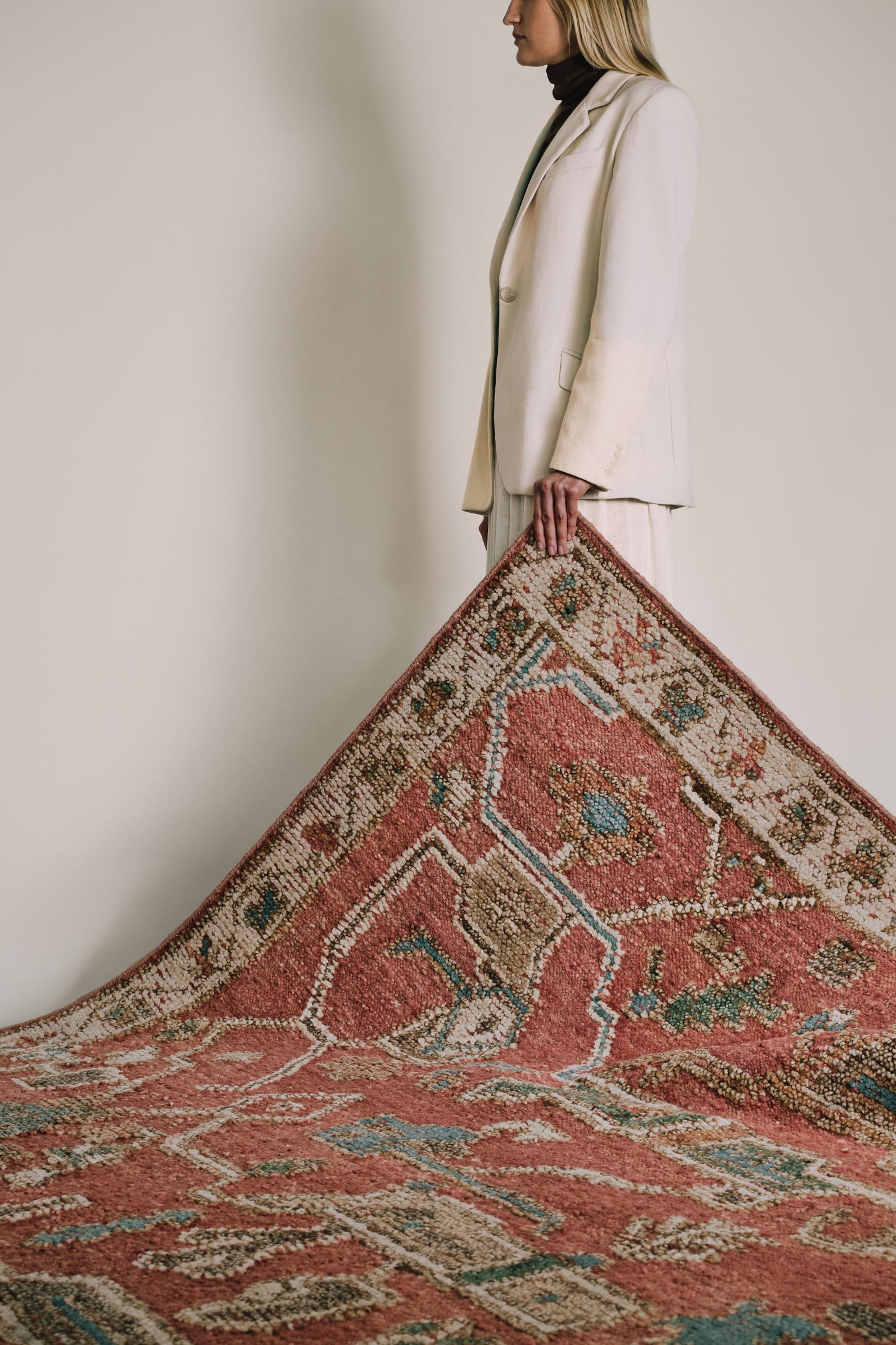 location of the Biri rug from the Oushak Collection, featuring a red, cream and muted blue traditional pattern.