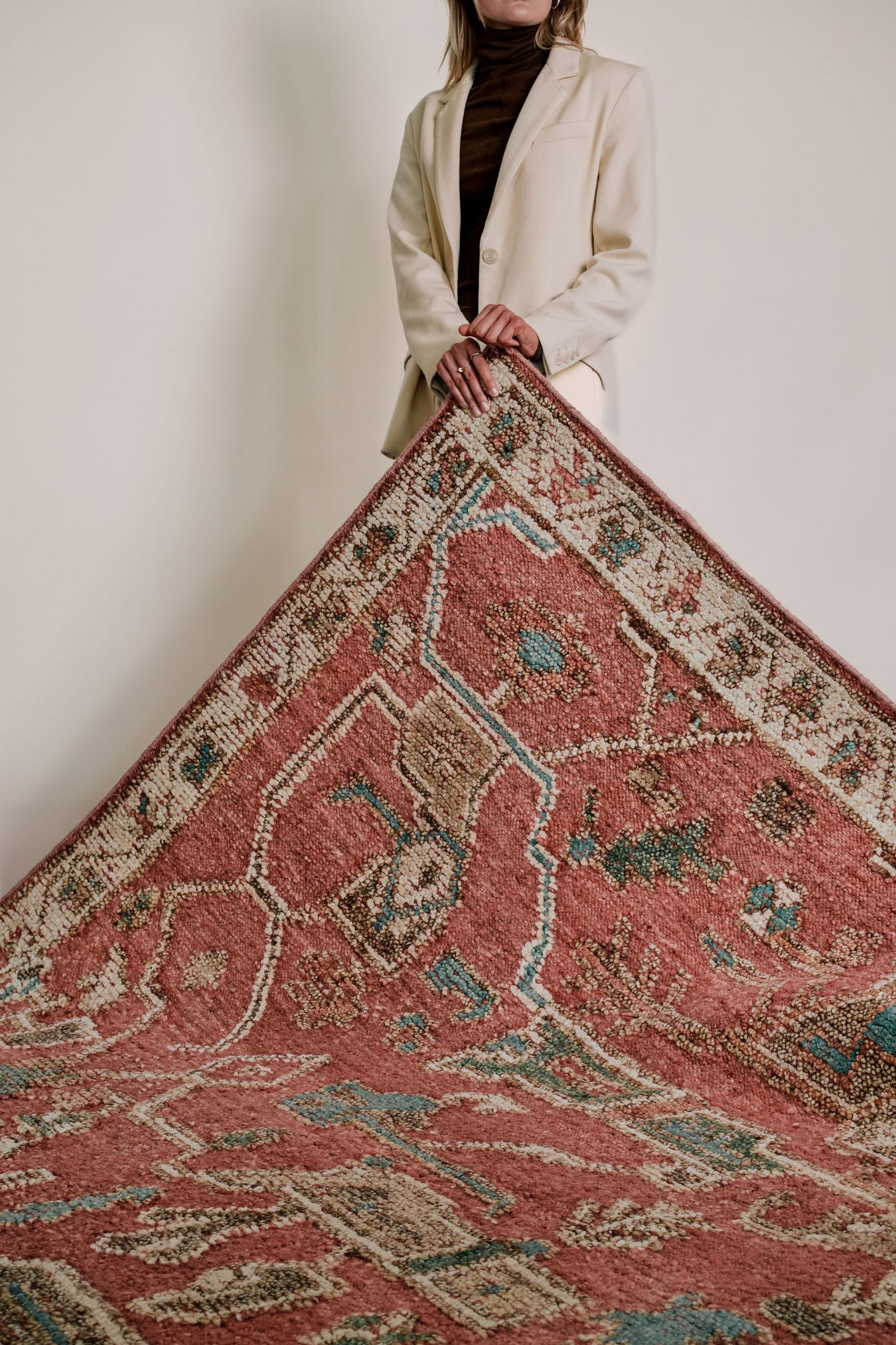 location of the Biri rug from the Oushak Collection, featuring a red, cream and muted blue traditional pattern.
