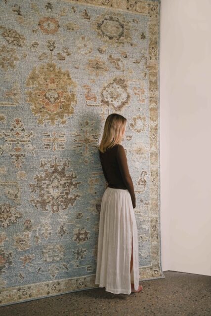 location image the Yok Blue rug from the Oushak Collection, featuring a soft blue, beige and terracotta traditional pattern