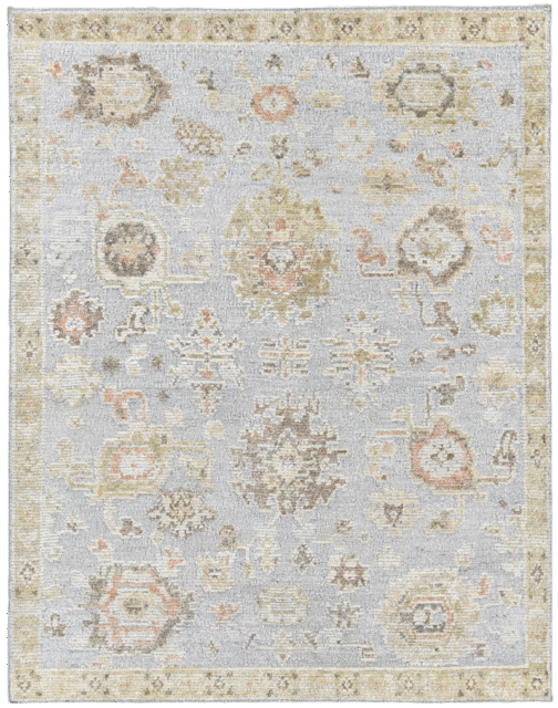 Overhead image of the Yok Blue rug from the Oushak Collection, featuring a soft blue, beige and terracotta traditional pattern