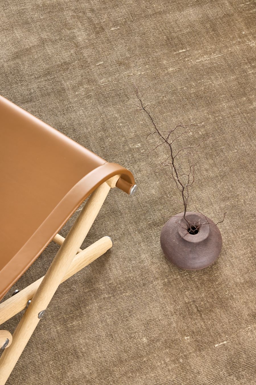 Close up image of the ravira taupe-beige rug