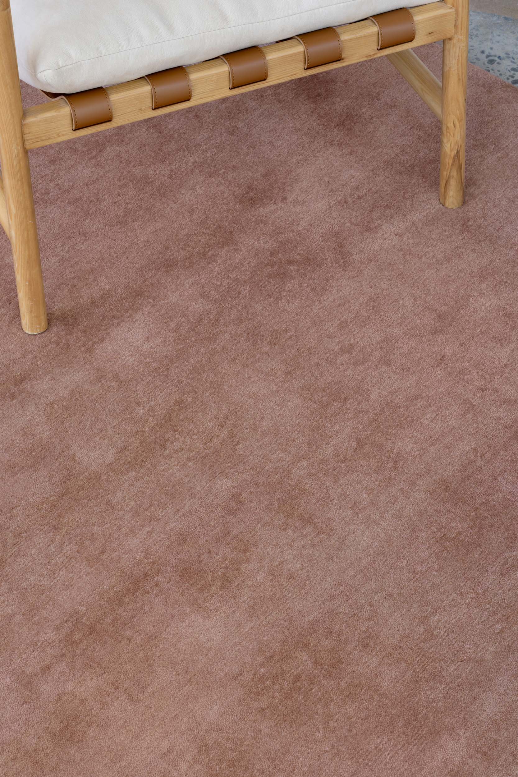 Close up image of the Baked Clay texture rug