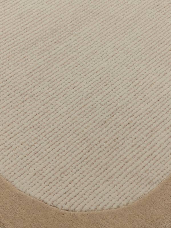 Close up image of the wolfram white salt rug with border
