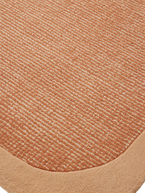 Close up image of the wolfram fudge rug with border