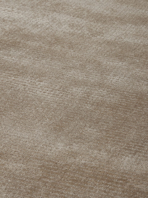 Close-up image of the wolfram beechwood-textures rug