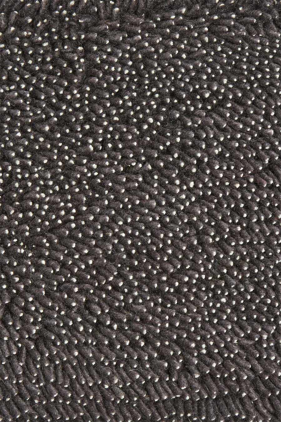 Close up view of textured Coral Shag rug in indigo colour