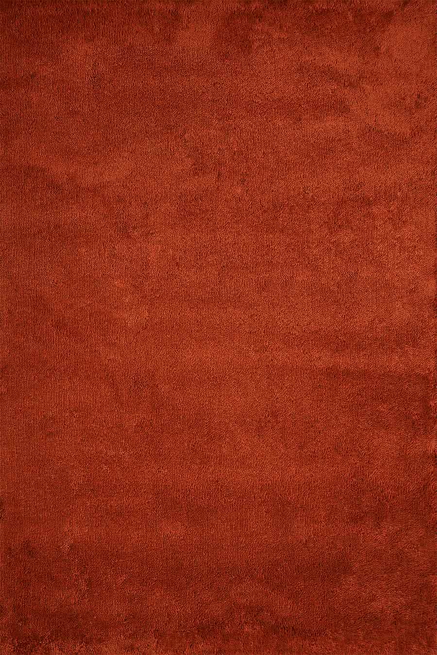Overhead view of textured Coral Shag rug in red colour