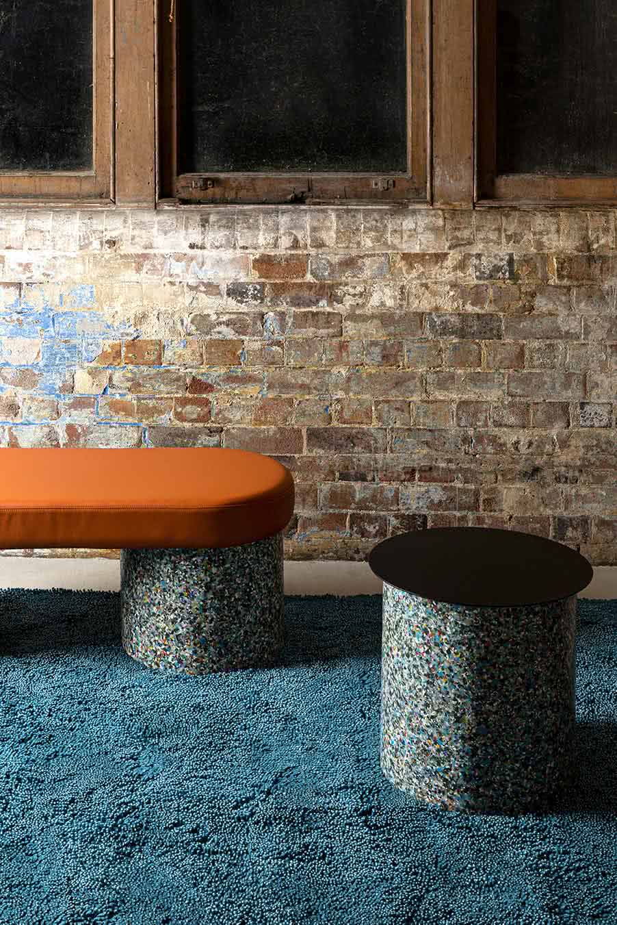 Styled view of textured Coral Shag rug in teal blue colour