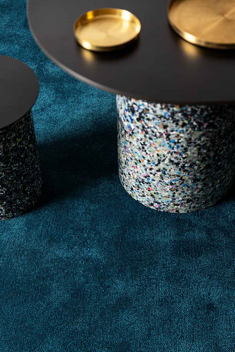 Close up dining room view of textured Napoleon Cut Pile rug in teal colour