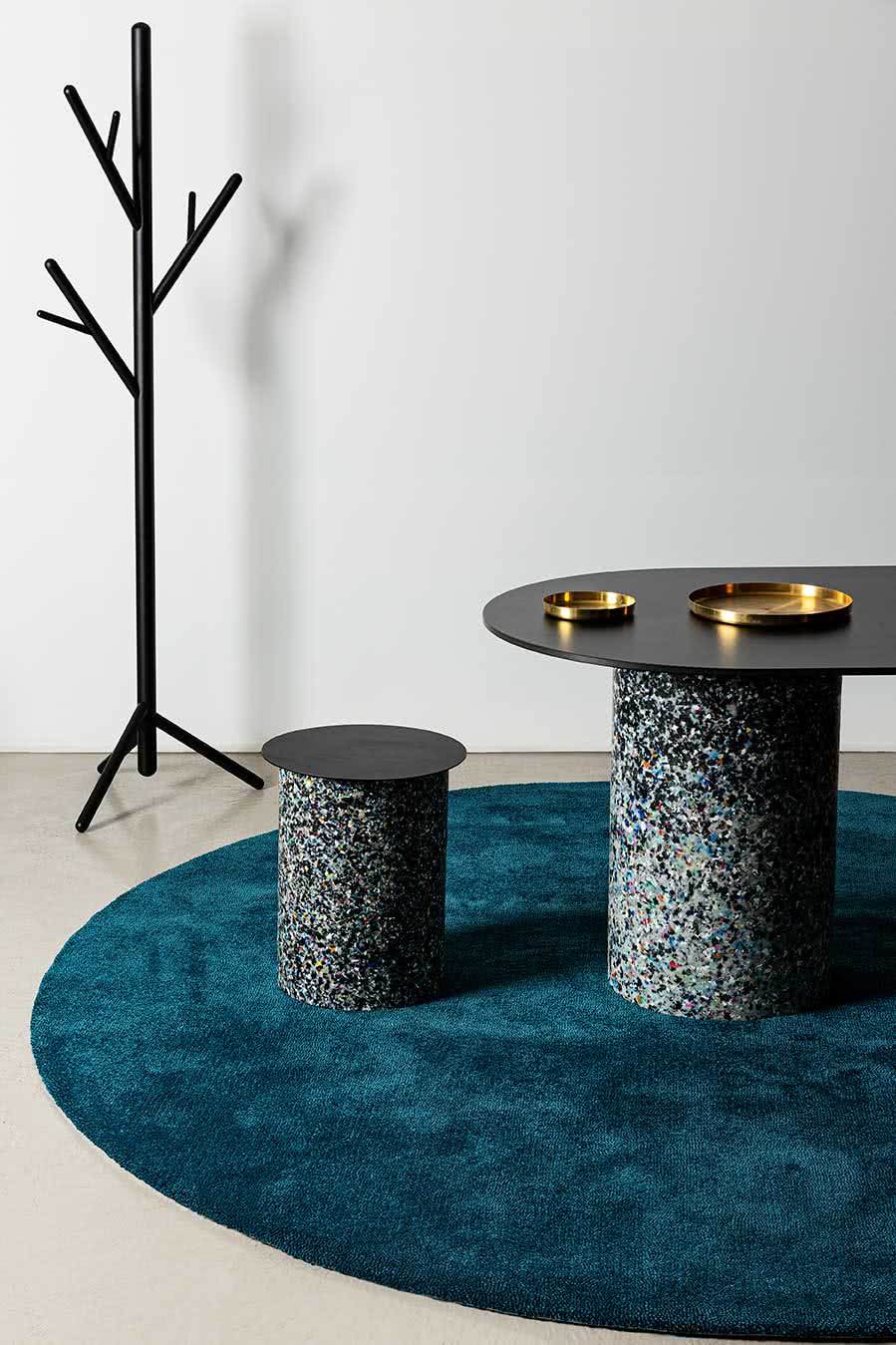 Dining room view of textured Napoleon Cut Pile rug in teal colour