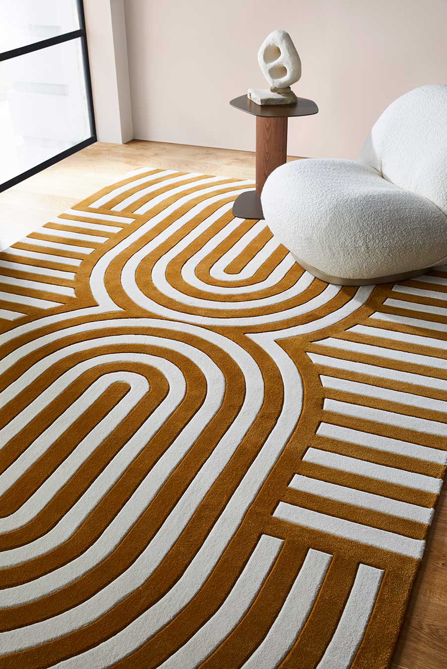 Living room view of modern, art deco Walter rug in mustard.