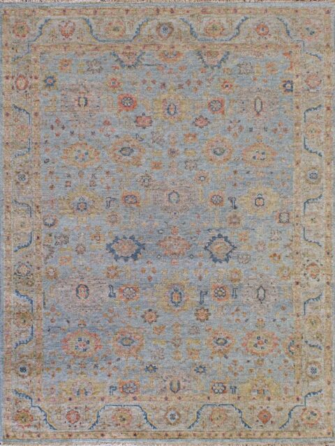 Close-up image of the Haveli Green handknotted rug, showcasing its intricate texture and rich green tones.