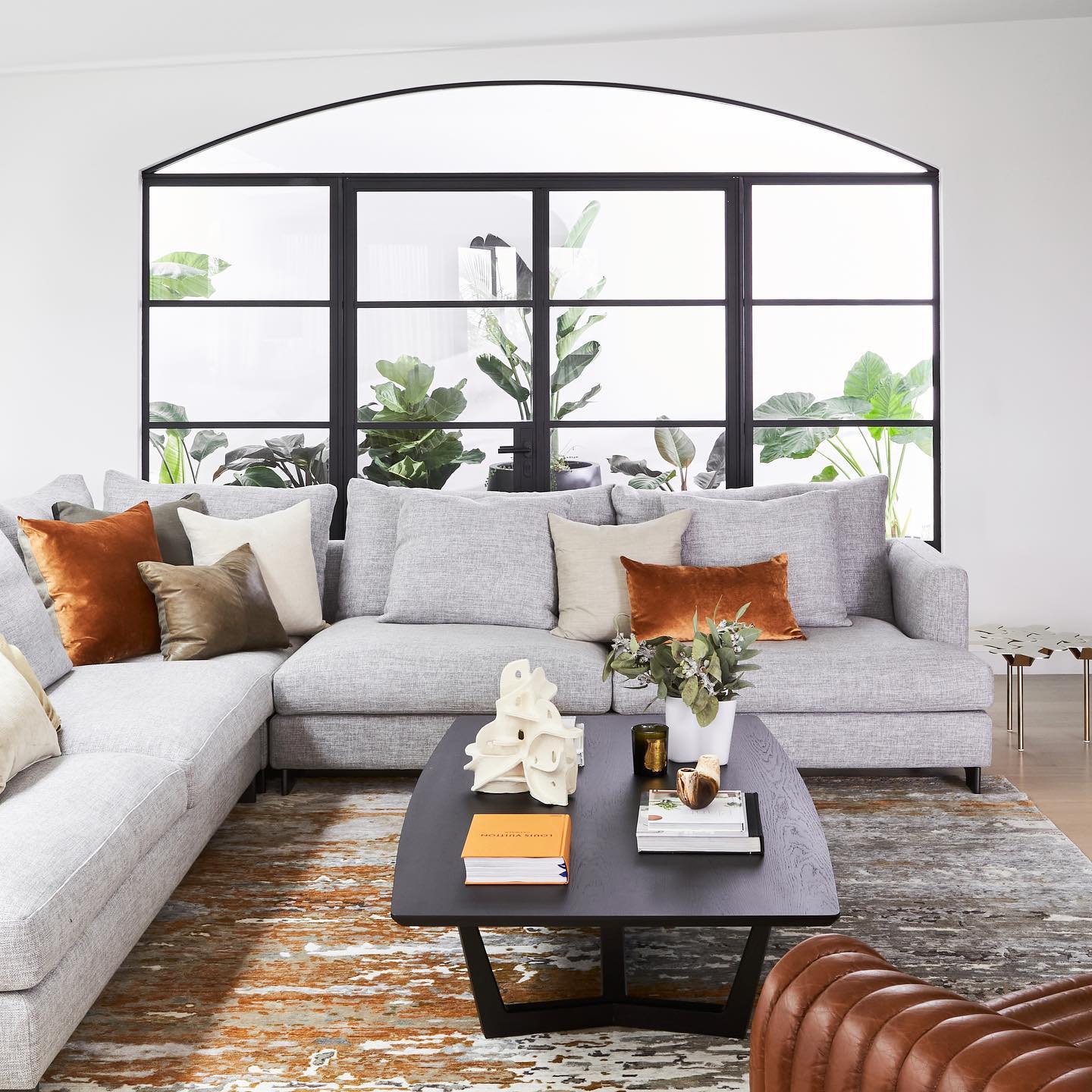 Living room view of distressed Aegean rug in gold colour