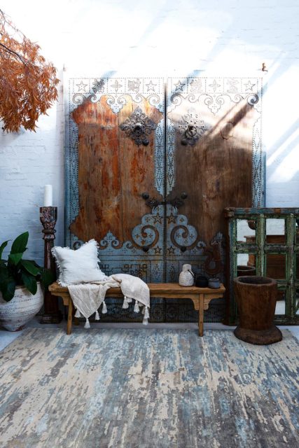 Living room view of distressed Aegean rug in blue colour