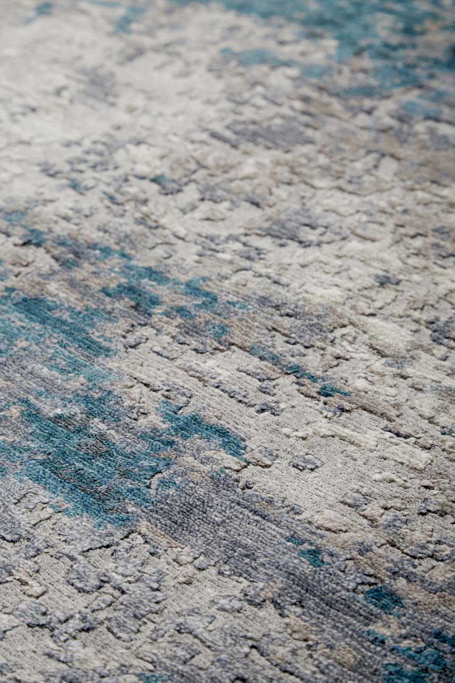 Detailed image of textural Aria rug in blue colour