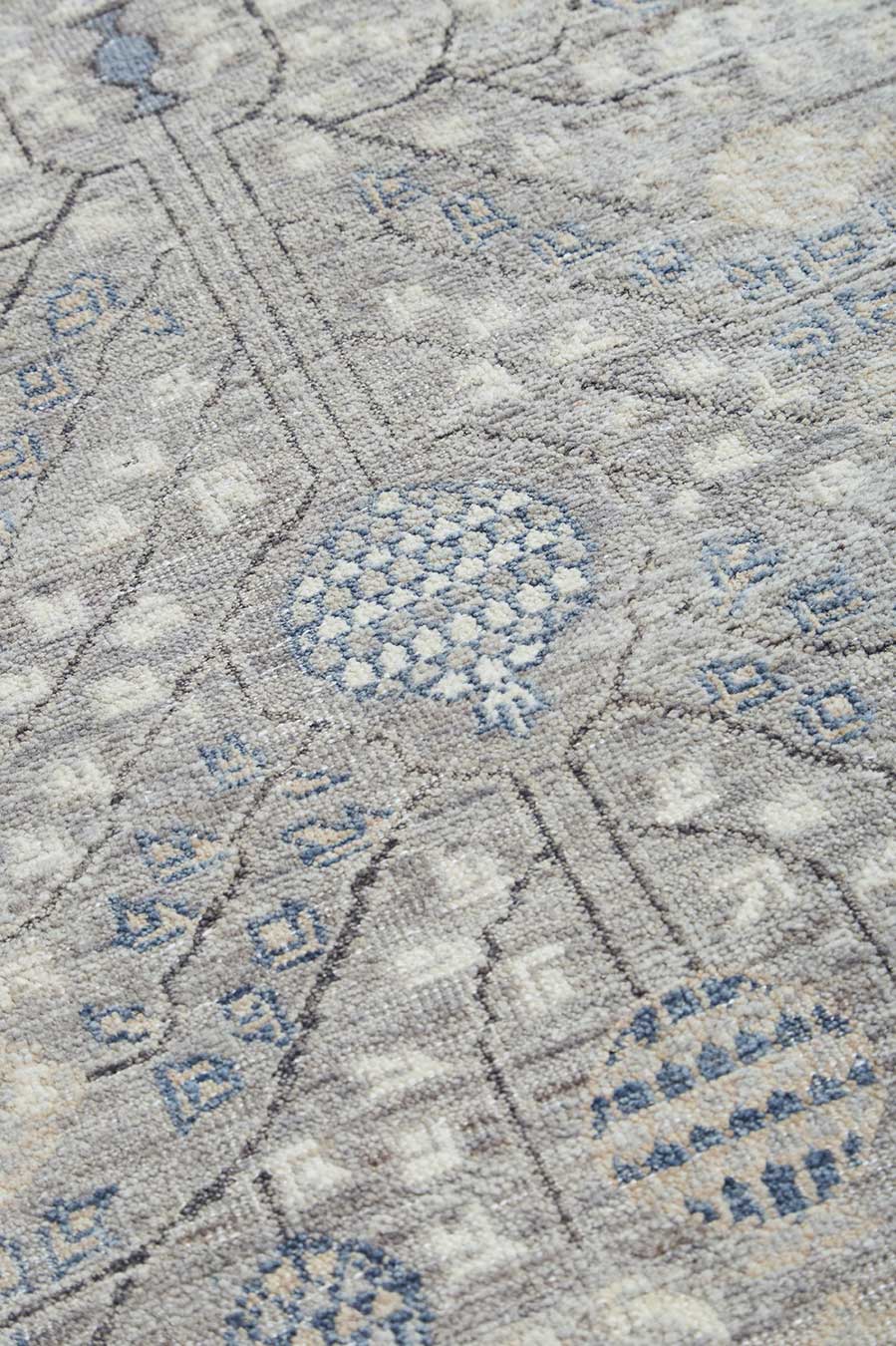 Close up image of traditional grey Cordoba rug