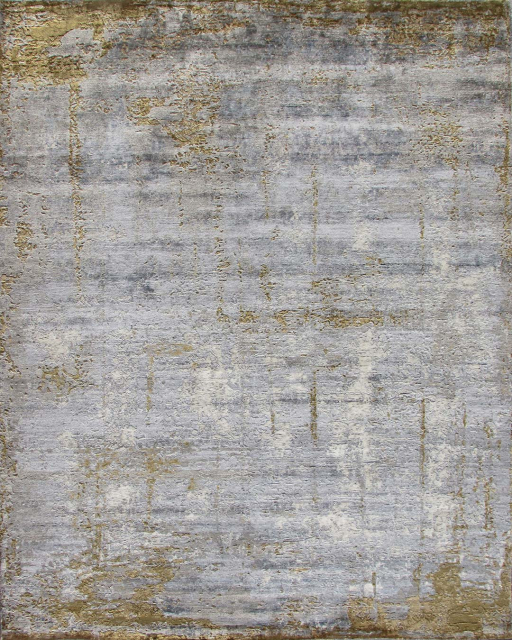 Overhead image of distressed Expose rug in gold colour