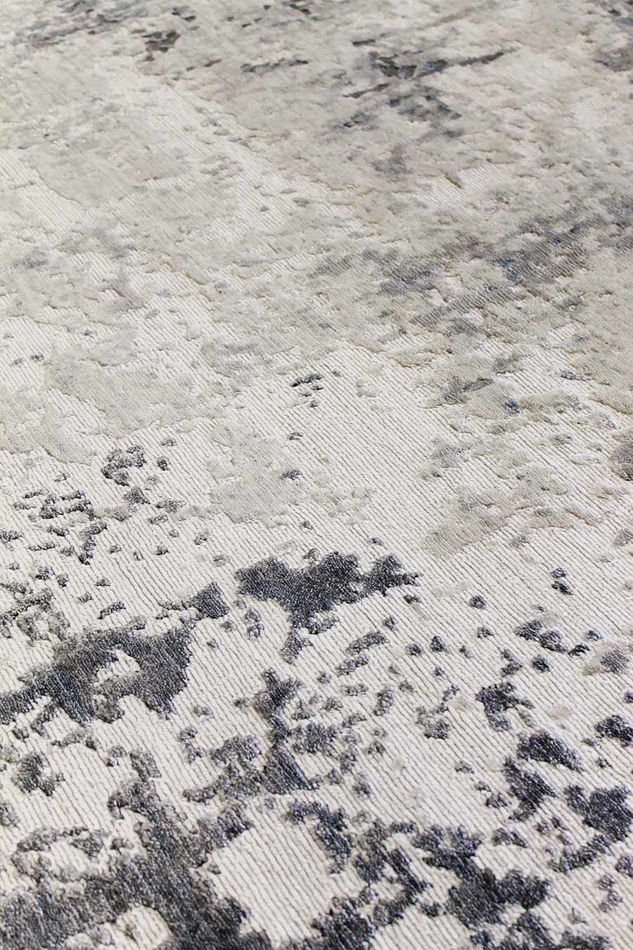 Detailed image of distressed Glacier rug in grey colour