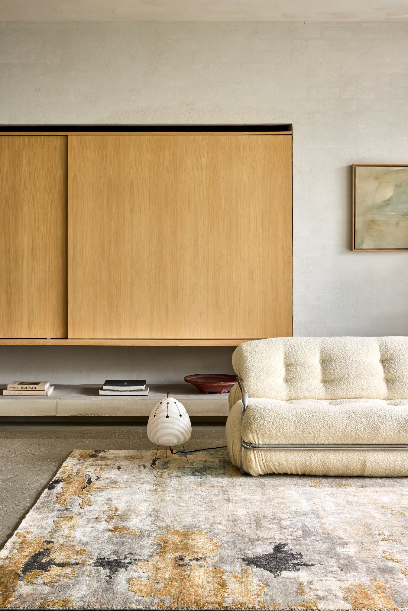 Living room image of distressed Glory Days handknot rug in gold and green