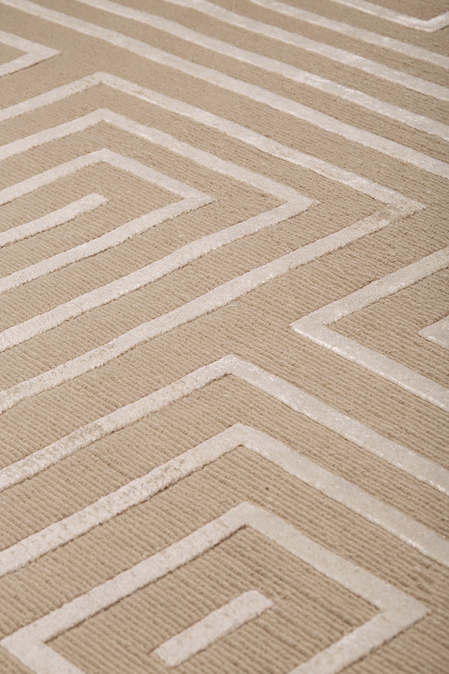 Detailed image of geometric Grave rug in beige