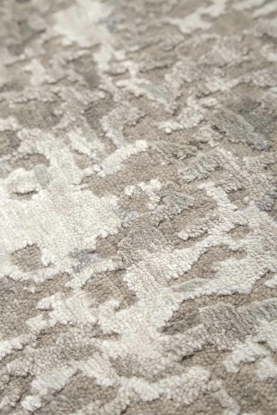 Detailed image of textured Midas handknot rug in silver colour