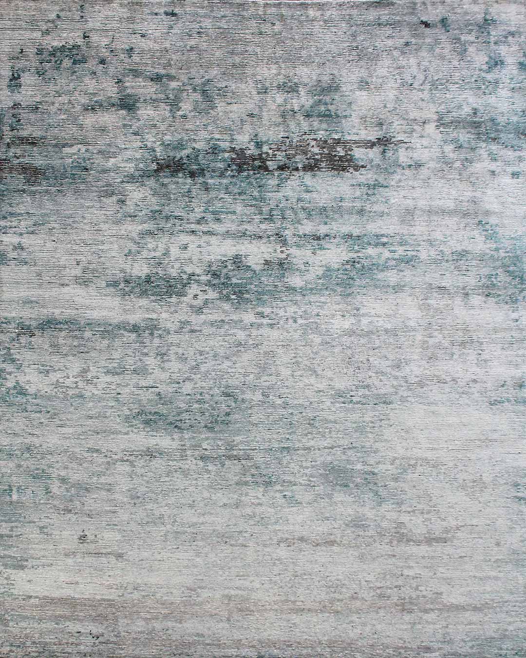 Overhead image of distressed Seamist rug in blue colour