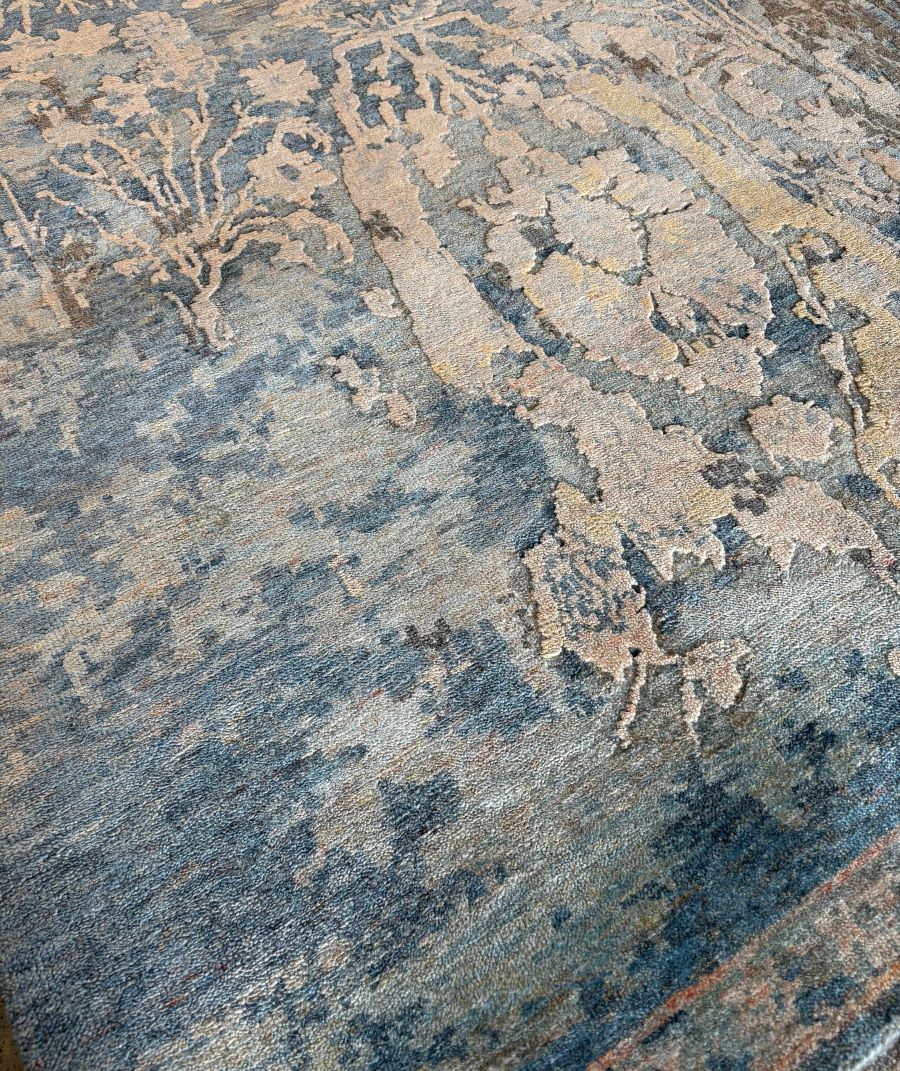 close up image of Seville handknot rug in blue and yellow colour