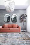 Living room image of distressed Skye rug in purple and pink