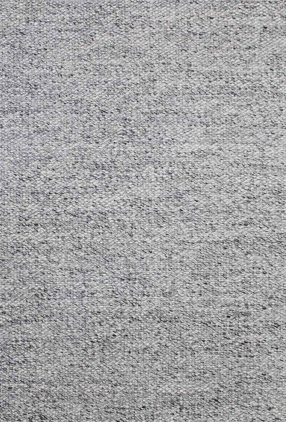 Overhead view of textured Cocos rug in grey colour