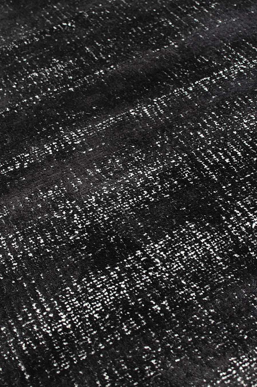 Close up view of textured Colorado rug in black colour