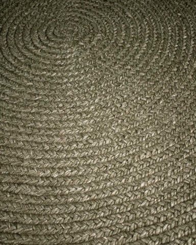 Close up view of Glenmore round rug in olive colour