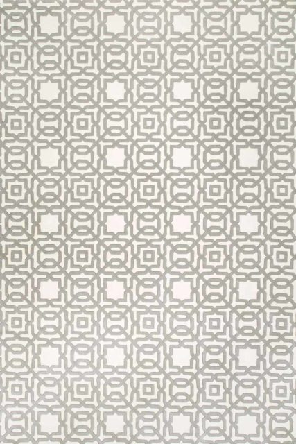 Overhead, detailed view of the classic, geometric patterns of our Leon rug un white and light grey