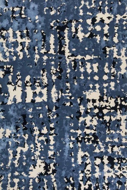 Overhead detailed view of our modern, textured Zandt rug design in blue