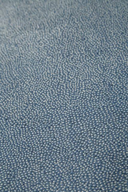 Close up of textured Coral Cut Pile rug in blue colour