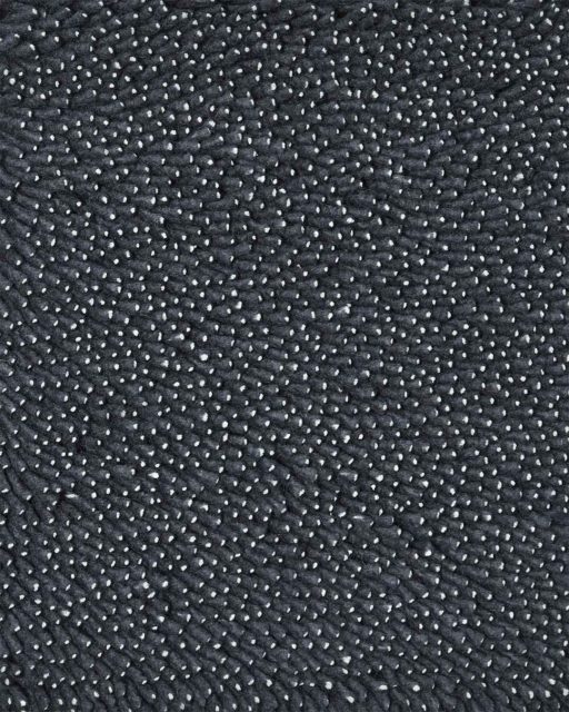 Close up view of textured Coral Shag rug in charcoal colour