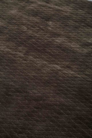 Close up view of textured Diamond Velour rug in dark brown colour