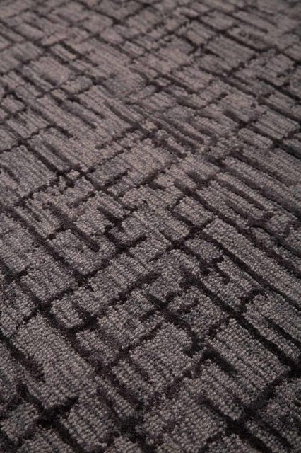 Close up view of textured Krypton rug in charcoal grey colour